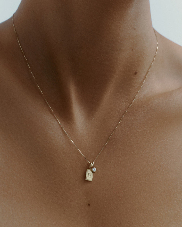 RESONATE INITIAL (9K GOLD)